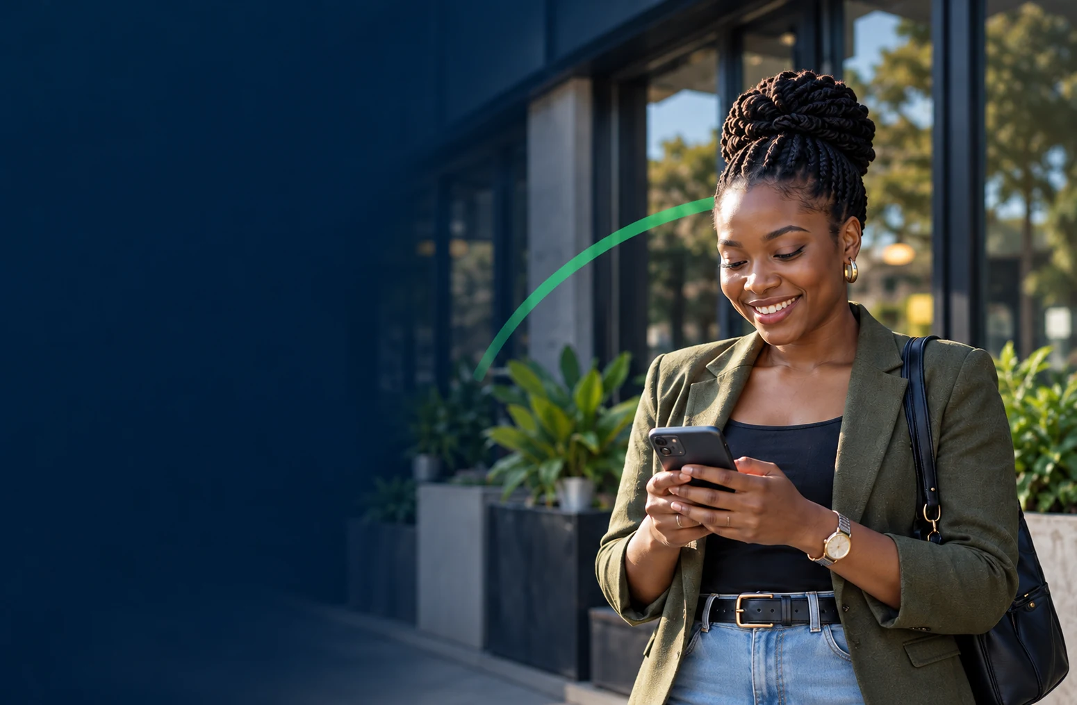 A Zimbabwean professional using her phone outside a business